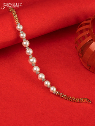 Bracelet with cz stones and pearls in gold finish