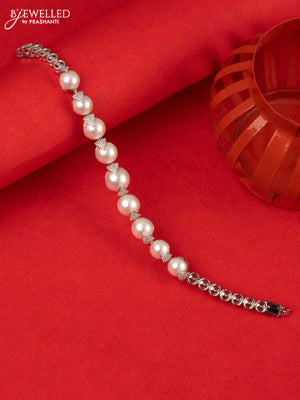 Bracelet with cz stones and pearls in silver finish