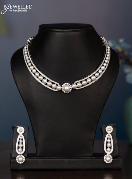 Zircon necklace with cz stones and pearls in silver finish