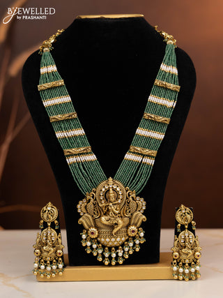 Antique beaded haaram krishna pendant with ruby and kundan stones in pearl & golden beads hangings