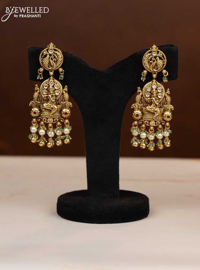 Antique beaded haaram krishna pendant with ruby and kundan stones in pearl & golden beads hangings