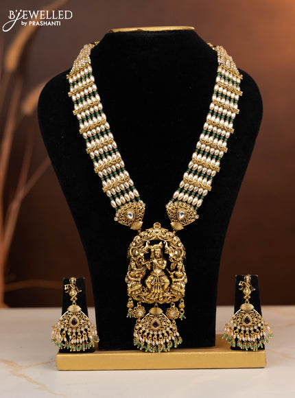 Antique beaded haaram krishna pendant with ruby and kundan stones in pearl & mint green beads hangings