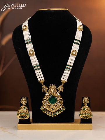 Antique beaded haaram ganesha design with emerald and kundan stones in golden beads hangings