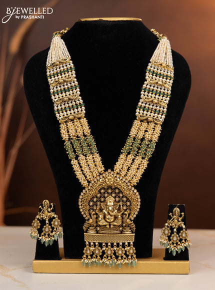 Antique multilayer beaded haaram ganesha pendant with kundan stones in mint green beads hangings