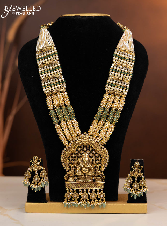 Antique multilayer beaded haaram ganesha pendant with kundan stones in mint green beads hangings