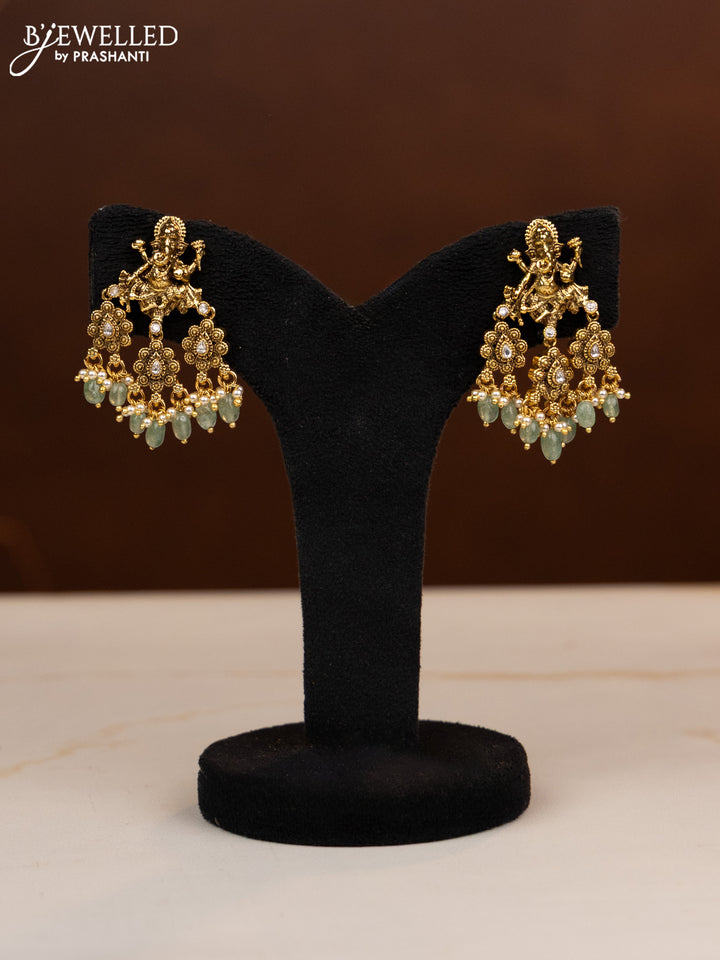 Antique multilayer beaded haaram ganesha pendant with kundan stones in mint green beads hangings