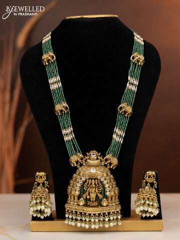 Antique beaded haaram ganesha pendant with kundan stones in pearl hangings
