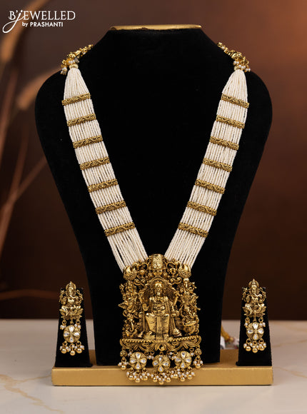 Antique beaded haaram ganesha pendant with kundan stones in pearl & golden beads hangings