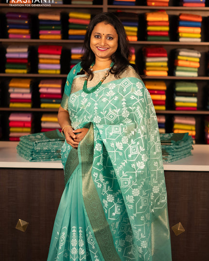 Banarasi semi organza saree teal green with allover embroidery work and woven border