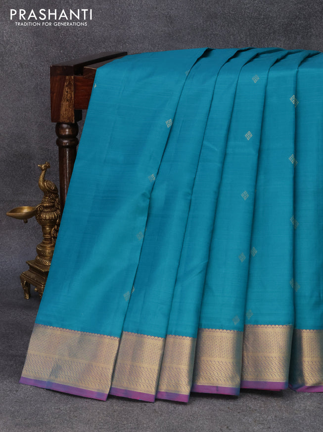 Pure kanjivaram silk saree teal blue and dual shade of bluish pink with zari woven buttas and zari woven border