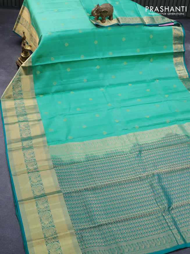 Pure kanjivaram silk saree teal green and teal blue with zari woven buttas and long annam zari woven border