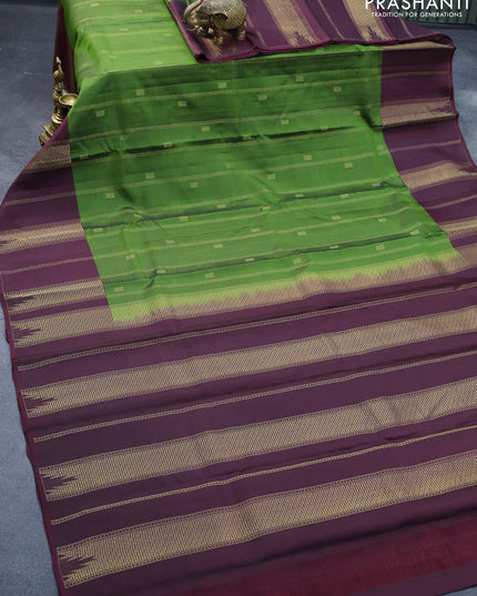 Pure kanjivaram silk saree mehendi green and wine shade with allover zari weaves & buttas and zari woven border