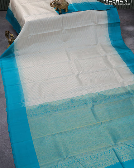Pure kanjivaram silk saree off white and teal blue with allover thread woven checked pattern and simple border