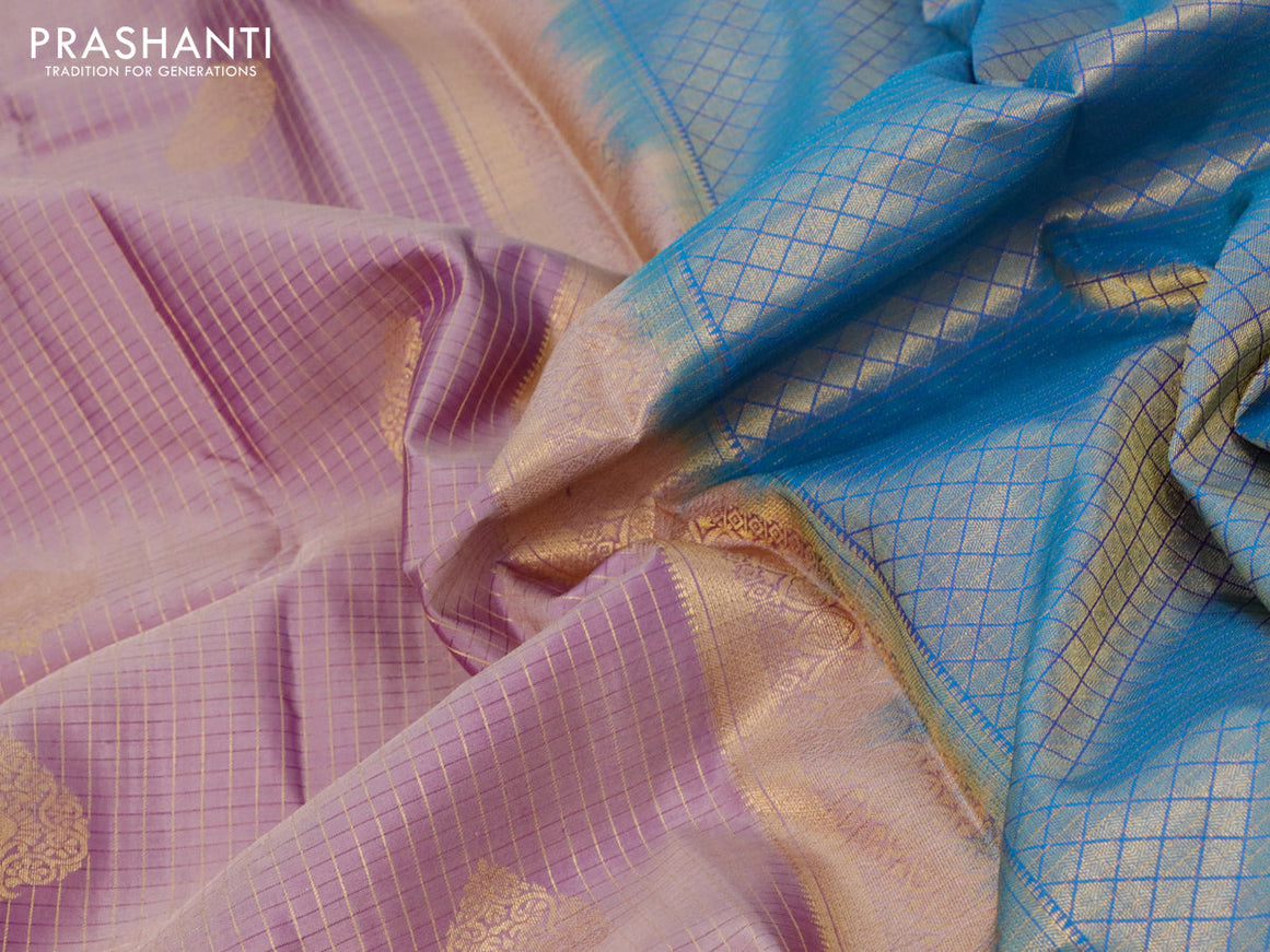 Pure kanjivaram silk saree mild purple and cs blue with allover zari checks & buttas and long zari woven border