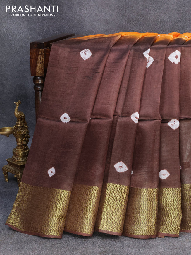 Banana silk saree orange and coffee brown with tie and dye batik butta prints and zari woven border
