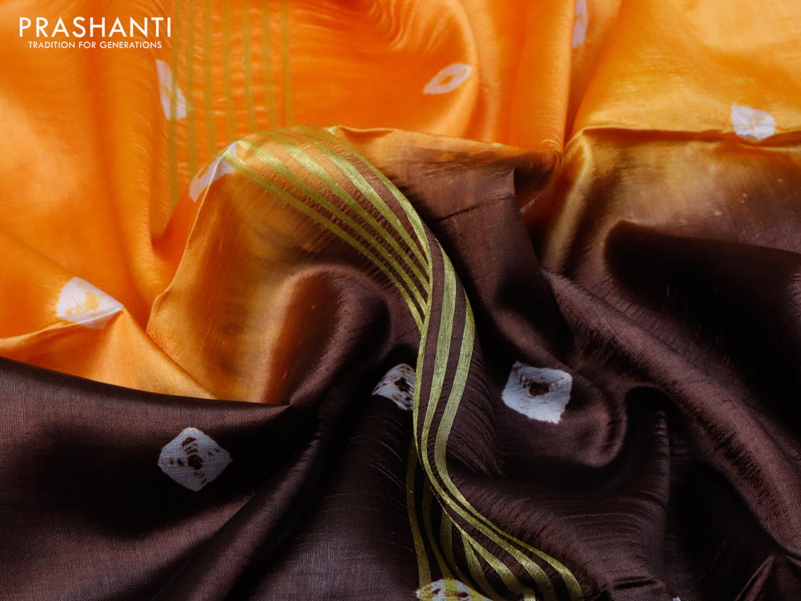 Banana silk saree orange and coffee brown with tie and dye batik butta prints and zari woven border