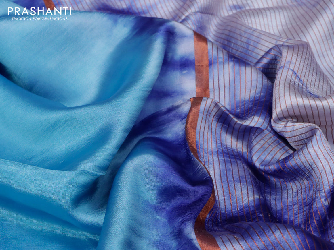 Banana silk saree light blue and off white blue with plain body and copper zari woven border
