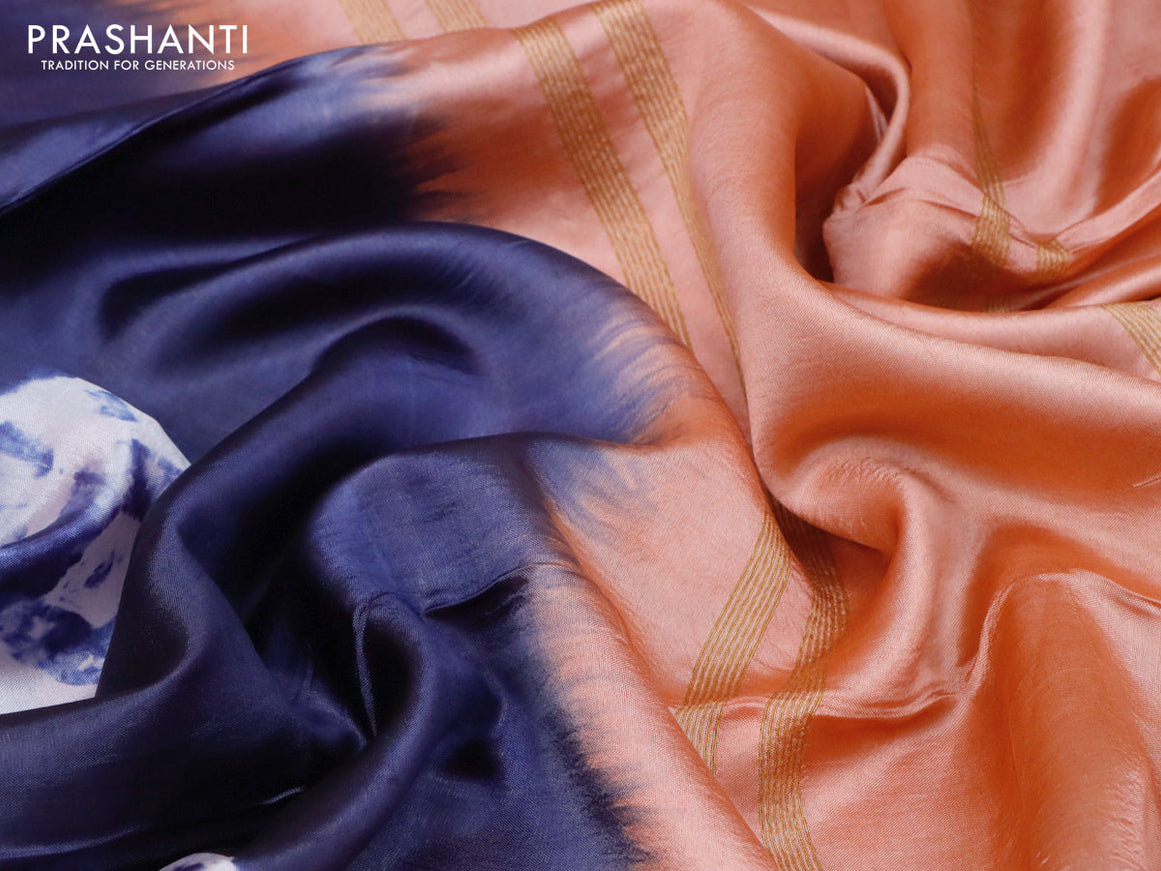 Banana silk saree navy blue and peach orange with allover batik butta prints and zari woven border