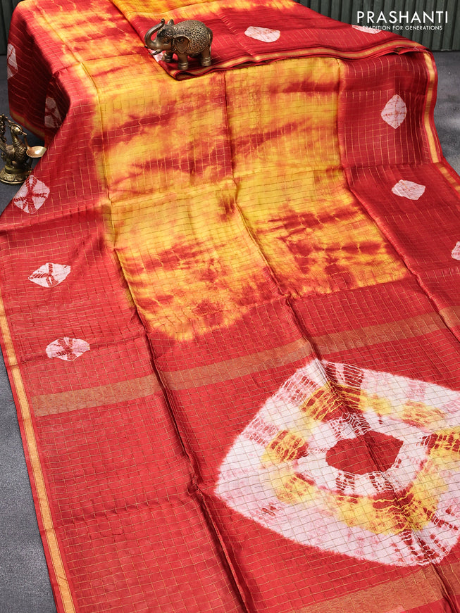 Banana silk saree yellow and red with allover zari checks & batik prints and small zari woven border