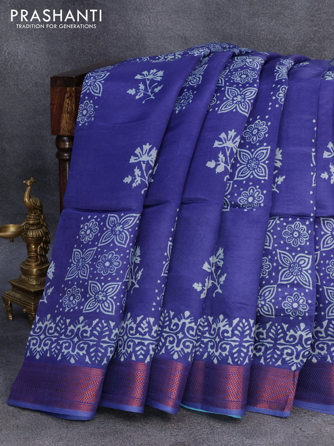 Banana silk saree blue and light blue with allover floral prints and copper zari woven border