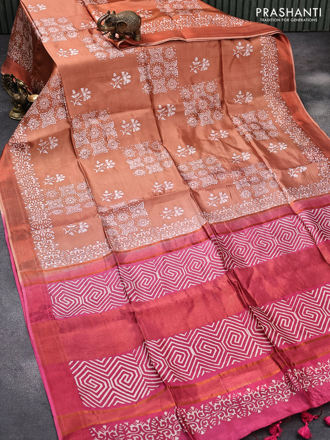 Banana silk saree pastel brown and pink with allover floral prints and copper zari woven border
