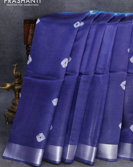 Banana silk saree light blue and blue with allover batik butta prints & silver zari buttas and silver zari woven border