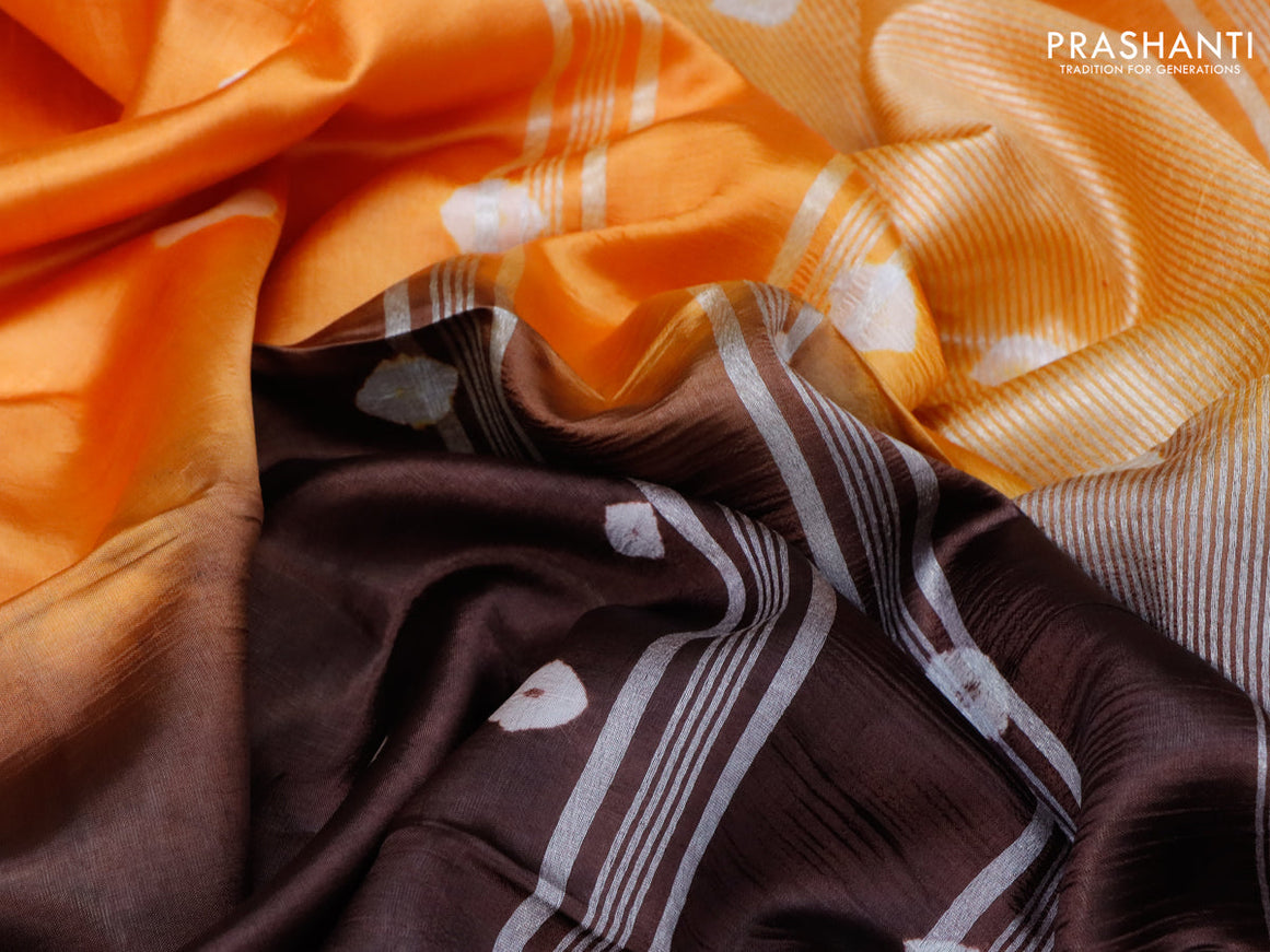 Banana silk saree orange and deep coffee brown with allover batik butta prints and silver zari woven border