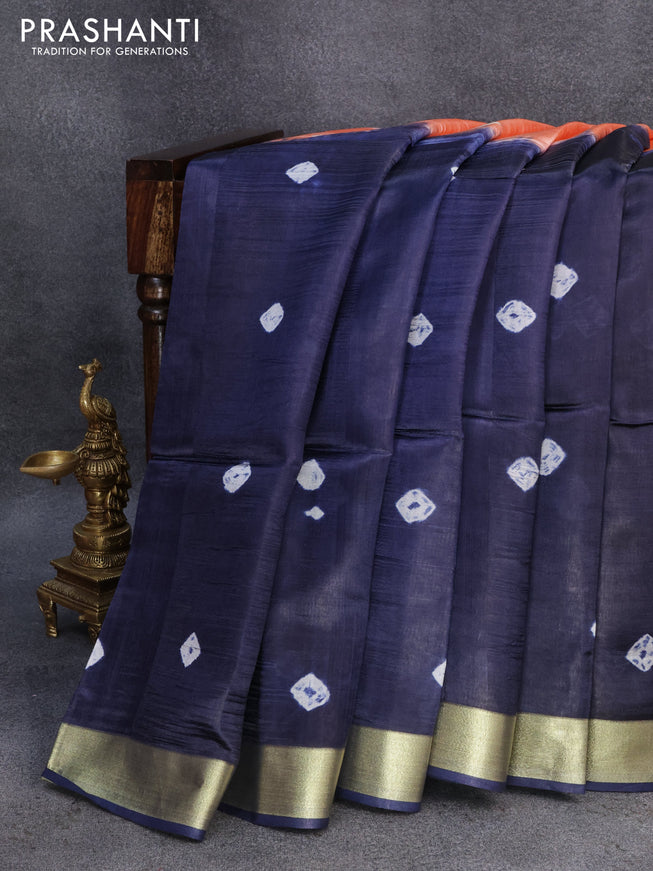 Banana silk saree peach orange and navy blue with allover batik butta prints and zari woven border