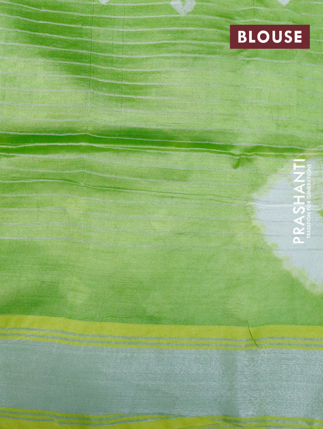 Banana silk saree lime yellow and light green with allover checked pattern and silver zari woven border