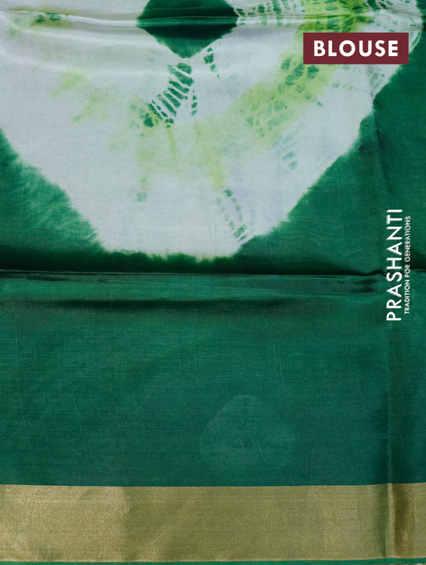 Banana silk saree light green and green with tie and dye batik butta prints and zari woven border