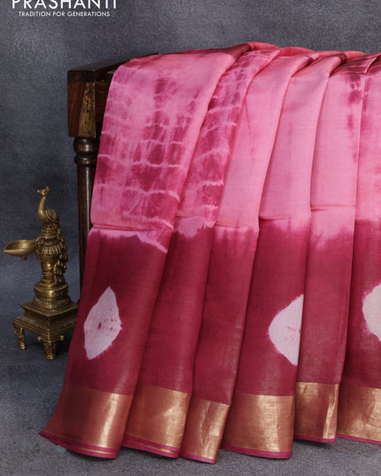 Banana silk saree pink and dark magenta with tie and dye batik butta prints and zari woven border
