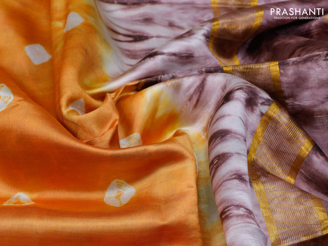 Banana silk saree orange and brown with tie and dye batik butta prints and zari woven border