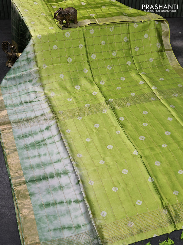 Banana silk saree off white green and light green with allover zari checks & batik butta prints and zari woven border