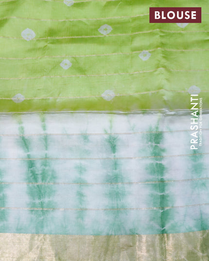 Banana silk saree off white green and light green with allover zari checks & batik butta prints and zari woven border