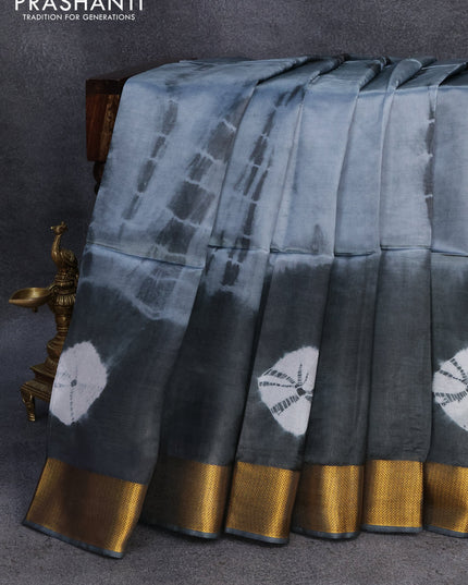 Banana silk saree grey and elephant grey with tie and dye batik butta prints and zari woven border