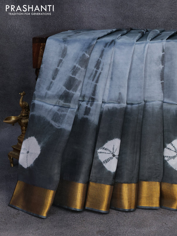 Banana silk saree grey and elephant grey with tie and dye batik butta prints and zari woven border