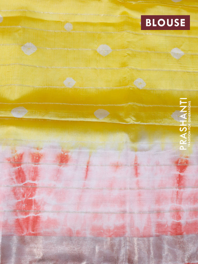 Banana silk saree yellow and red with allover zari checked pattern & batik butta prints and zari woven border