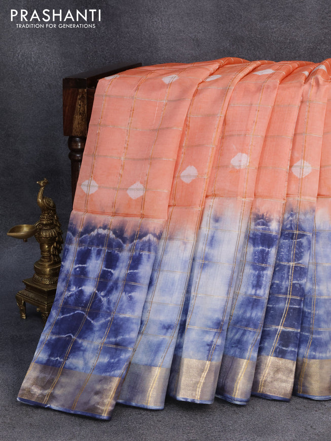 Banana silk saree peach orange and blue with allover zari checked pattern & batik butta prints and zari woven border