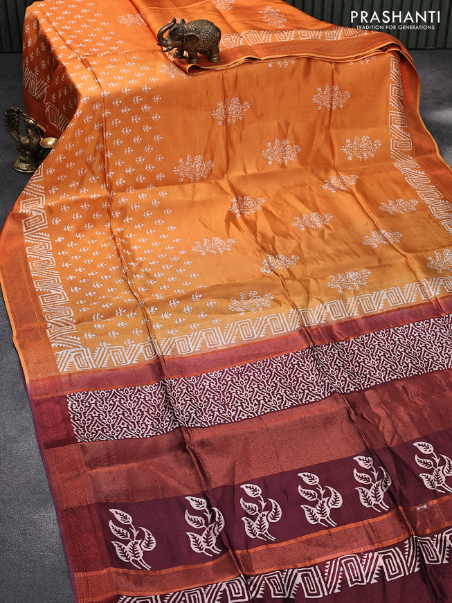 Banana silk saree orange and deep maroon with allover butta prints and copper zari woven border