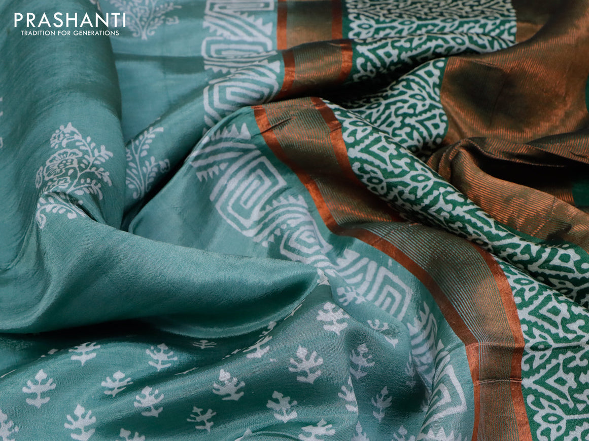 Banana silk saree pastel green and green with allover butta prints and copper zari woven border