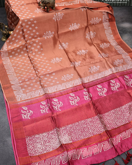 Banana silk saree peach shade and magenta pink with allover butta prints and copper zari woven border