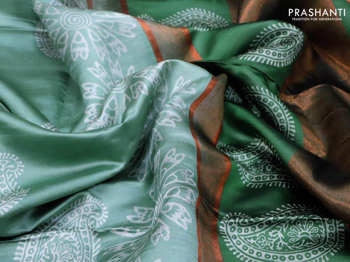 Banana silk saree pastel green and dark green with allover paisley & floral prints and copper zari woven border