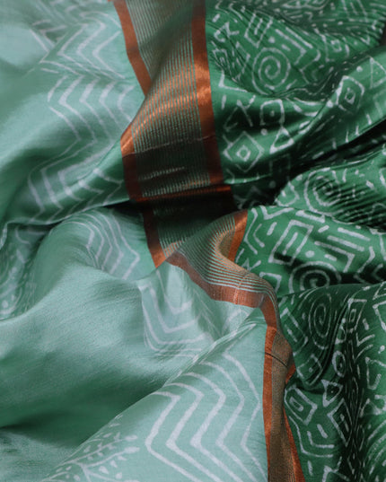 Banana silk saree pastel green and green with tree butta prints and copper zari woven border