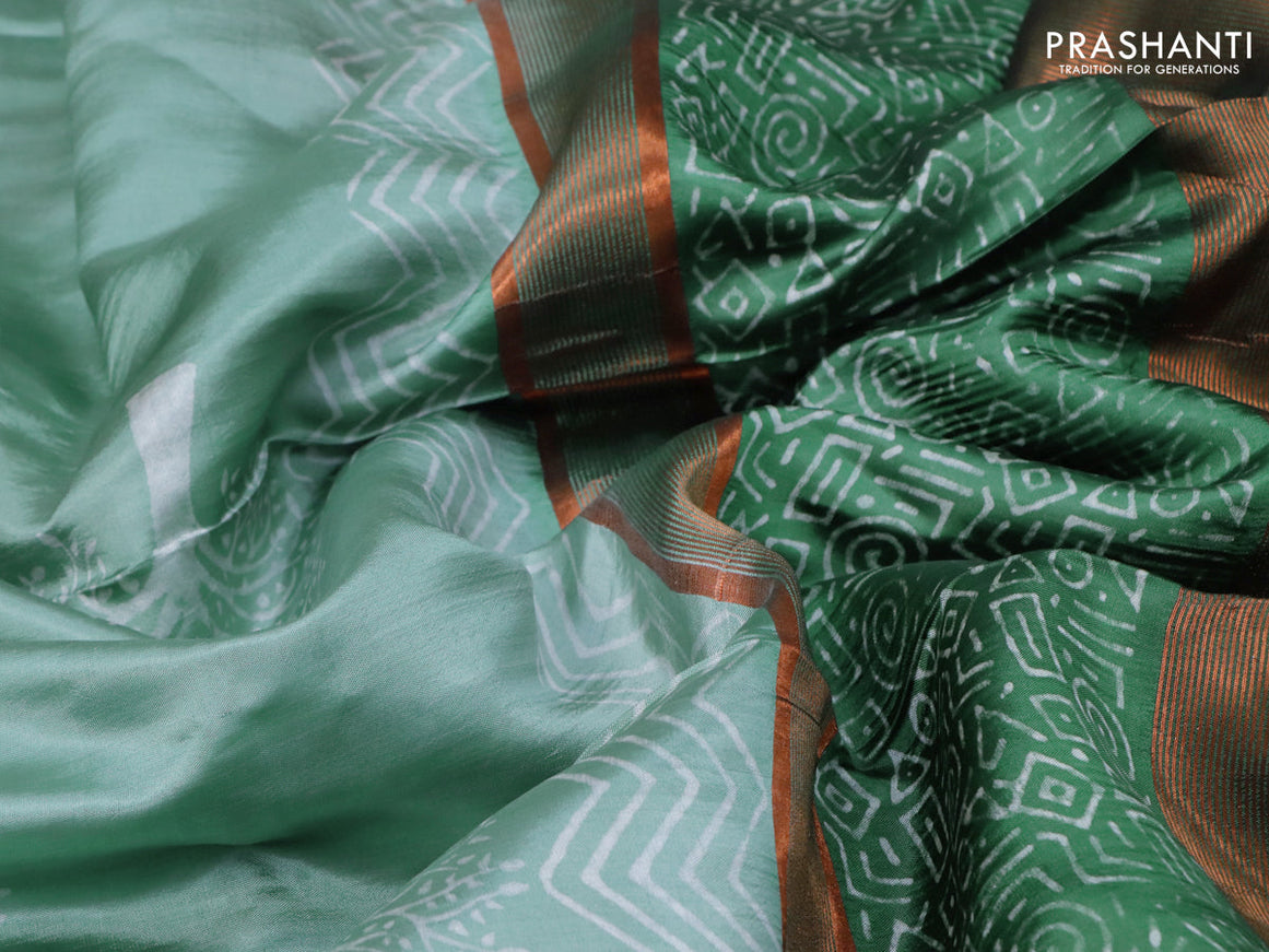 Banana silk saree pastel green and green with tree butta prints and copper zari woven border