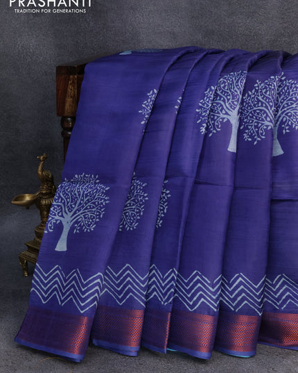 Banana silk saree blue and cs blue with tree butta prints and copper zari woven border