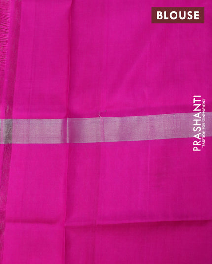 Pure uppada silk saree dual shade of pinkish orange and pink with silver zari woven floral buttas and long silver zari woven butta border
