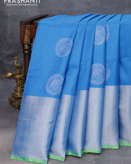 Pure uppada silk saree cs blue and dual shade of green with silver zari woven buttas and long silver zari woven border