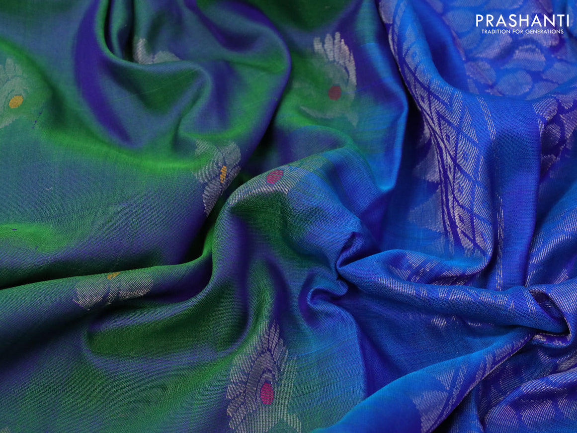 Pure uppada silk saree dual shade of bluish green and blue with thread & silver zari woven buttas and long silver zari woven paisley butta border