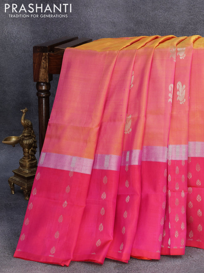 Pure uppada silk saree dual shade of yellowish pink and pink with silver zari woven buttas and silver zari woven butta border