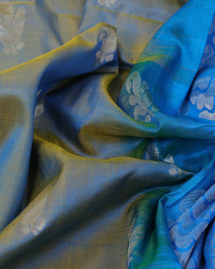 Pure uppada silk saree dual shade of bluish yellow and cs blue with silver zari woven buttas and silver zari woven butta border